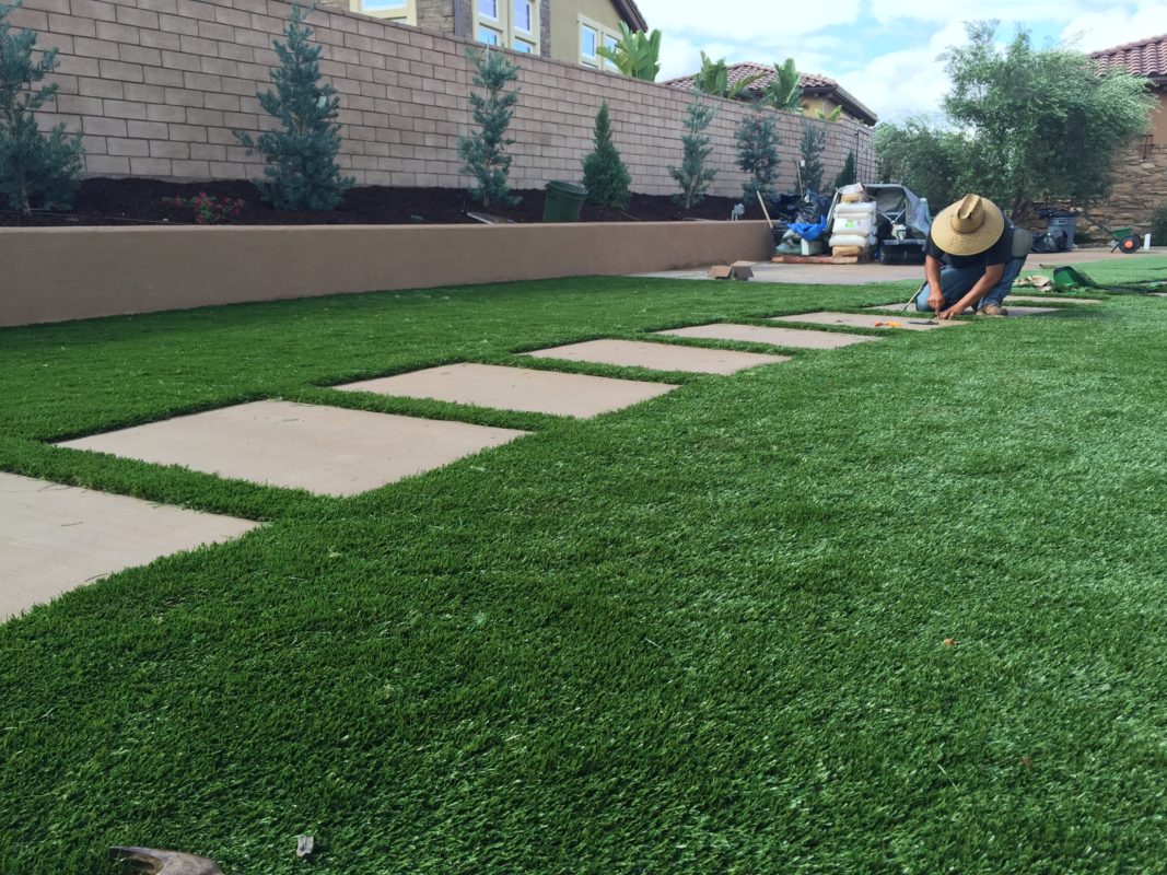 Artificial Turf of Dallas team performing professional artificial turf installation in Dallas